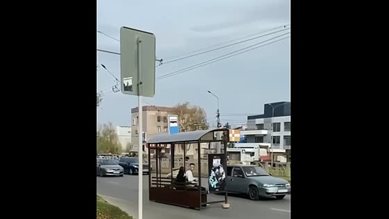 Driver turns bus stop pavilion into moving vehicle with passengers aboard