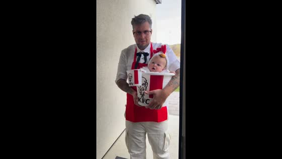 Adorable baby dressed as a chicken goes trick-or-treating in London, UK