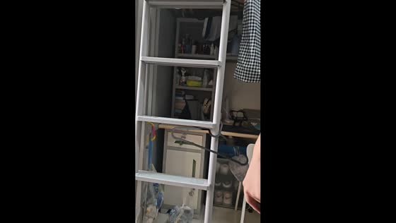 Clothes hanger spins down steps in Inner Mongolia, China