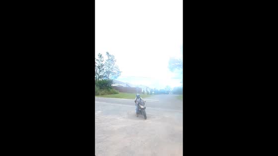 Motorcyclist hides from police at gas station in Orlando, Florida, USA