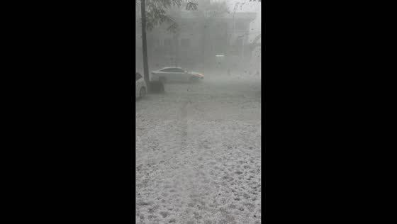 Hailstorm reduces visibility and covers roads in Hebei, China