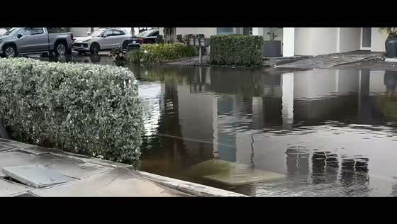 King Tides inundate Las Olas Boulevard, flooding streets and parking areas in Florida, USA
