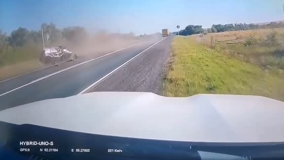 Dangerous overtaking maneuver causes head-on collision on highway in Oktyabrsky, Russia