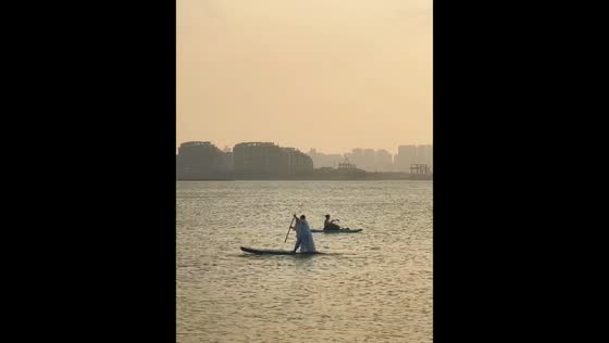 Man falls into water while riding paddle boat in Hainan, China