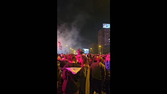 Crowds cheer and play music during election victory celebrations in New Belgrade, Serbia