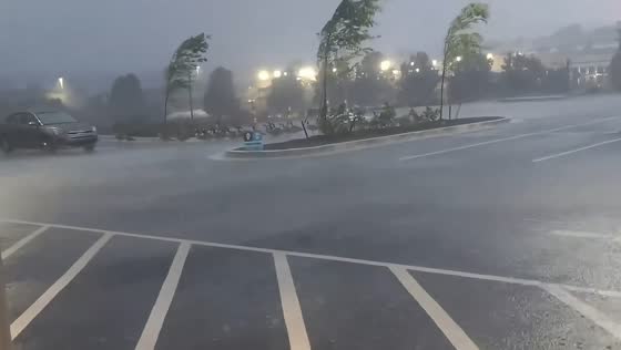 Powerful winds and blinding rain lash at parking lot in Nicholasville, USA