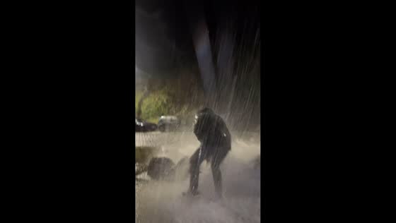 Man gets soaked by sudden wave while waiting in San Sebastian, Spain
