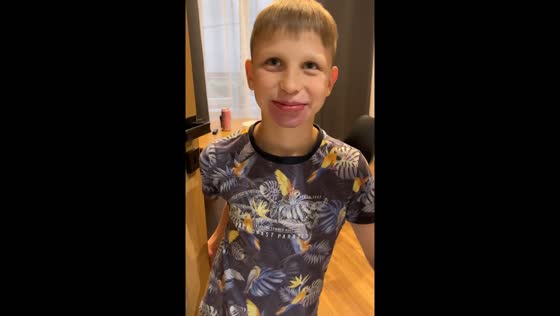 Son's blue lips amuse parent in Katowice, Poland