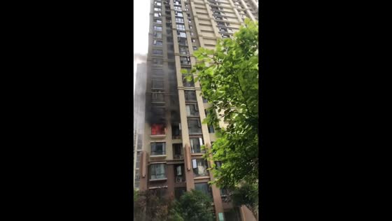Apartment fire breaks out at high-rise residential building in Changsha, Hunan, China