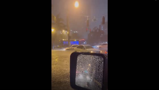 Knee-high flush floods submerge Fort Lauderdale streets after heavy downpour