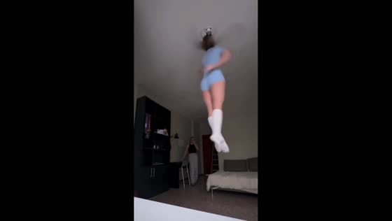 Former circus performer spins while hanging from ceiling rig in Moscow, Russia