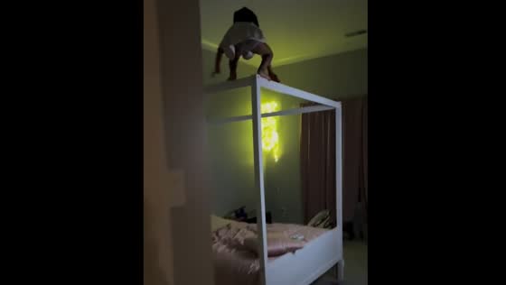 Child climbs bed canopy frame and jumps onto bed in Huntsville, Alabama