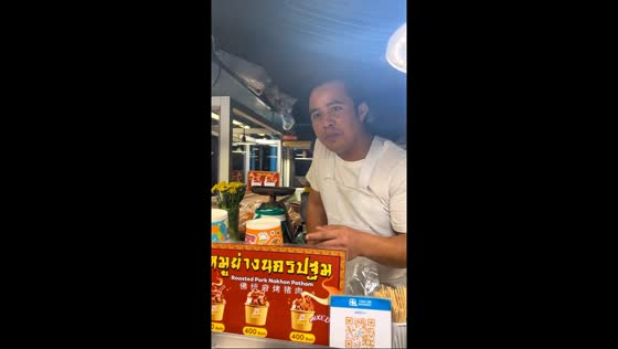 Funny food stall interaction at Chatuchak Market, Bangkok, Thailand