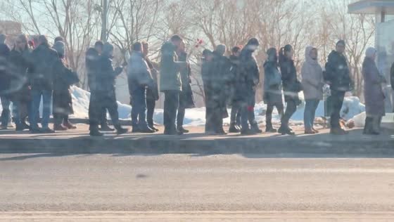 Thousands queue to pay respects at Navalny's grave in Moscow