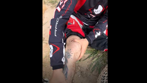Person screams in pain after stretching leg over knee