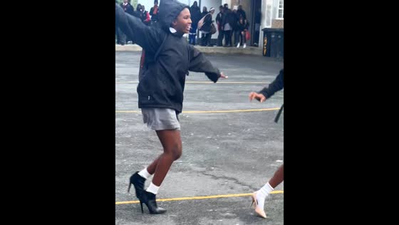 Student struggles to walk in stilettos at school in Cloetesville, South Africa