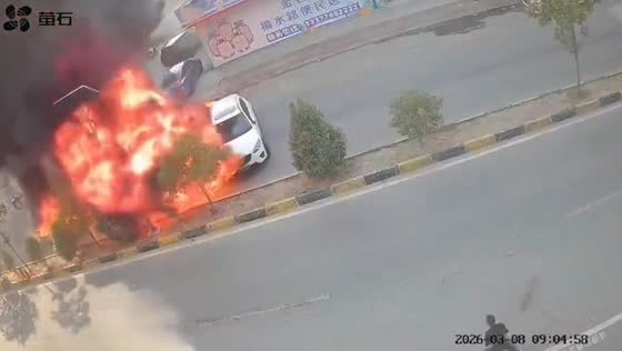 White car engulfed by flames during sudden roadside fire in Chaozhou, Guangdong, China