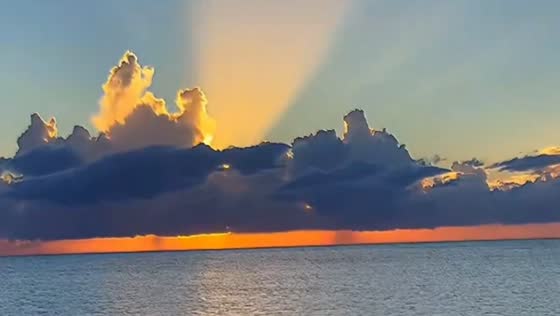 Golden sunset glow over the ocean in Venice Beach, Florida, USA