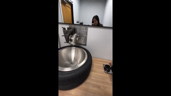 Gear up for style! custom sink features car tire base and gearshift faucet