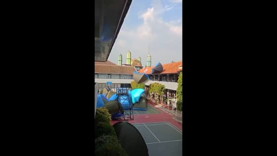 Tent chaos: winds sweep scout camp preparations in Cibinong, Indonesia