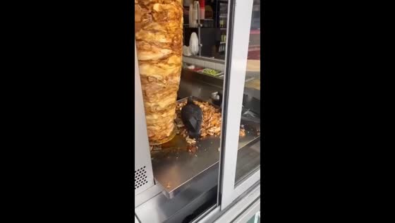 Pigeons caught pecking shawarma meat at Moscow, Russia
