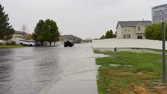 Heavy rain causes flooding and road closures in Stansbury Park, Utah, USA
