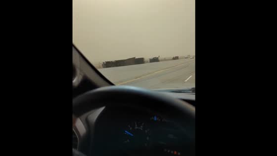 Vehicles toppled on the roadside in Amarillo, Texas