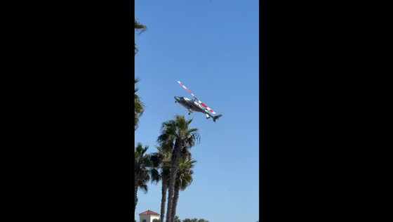 Helicopter crashes near beach in Huntington Beach, California, USA