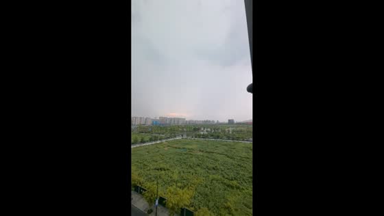 Lightning strikes near roadway during storm in Zhejiang, China