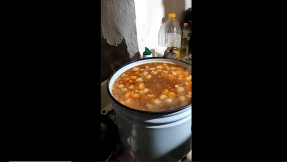 Ukrainian soldiers of the 135th battalion cooking for comrades in Bakhmut amidst conflict