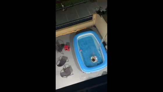 Child flees inflatable pool in fear after water prank in Guangdong, China