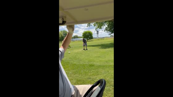 Golf shot narrowly misses friend sitting in cart in Butler, Pennsylvania, USA