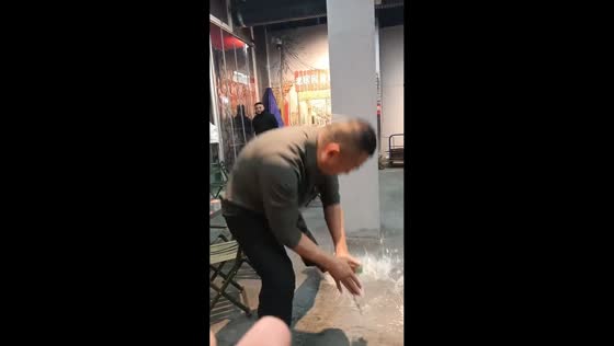 Man shatters full beer bottle with pinpoint Kung Fu technique in Jiangsu, China