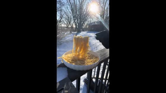 Frozen spaghetti challenge highlights extreme cold in Ely, Minnesota, USA