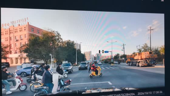 Car collides with an e-bike rider at an intersection in Inner Mongolia, China