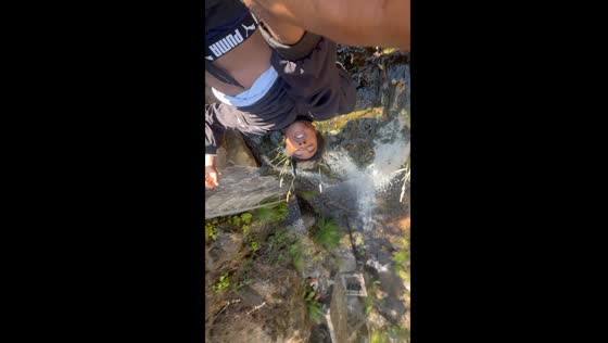 Person hangs upside down over waterfall in Fairfield, California
