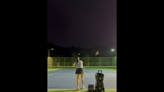 Woman accidentally hits flying bat while practicing tennis in Guangdong, China