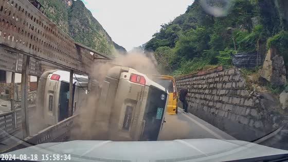 Truck overturns in Kangding, China after suspected brake failure