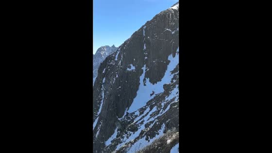Two people slip on snowy mountainside in Yunnan, China