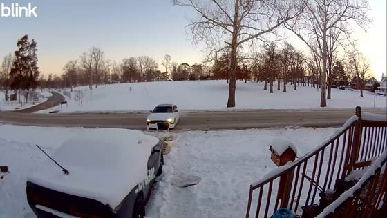 Car bumper ripped off while backing out in deep snow in Keokuk, USA