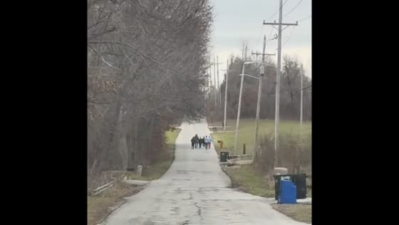 Driver humorously jokes about earning points for spotting pedestrians in the road in Kansas, USA