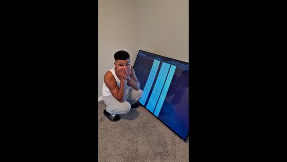 65'' TV slips and breaks during unboxing in Orlando, Florida, USA