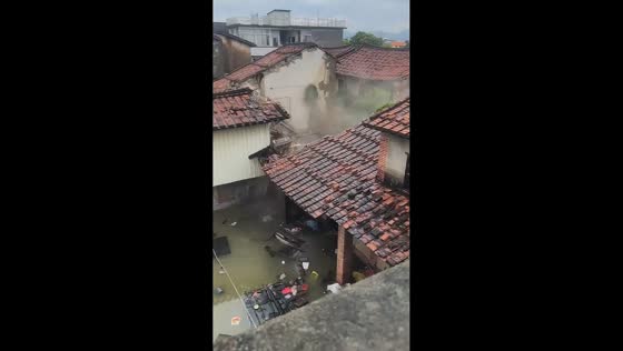 Flood-damaged traditional house partially collapses after torrential rain in Fujian, China