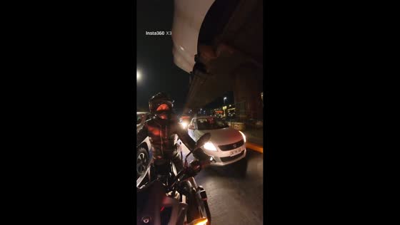Motorcyclist knocked over after being rear-ended in Santiago, Chile