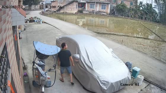 Residents protect vehicles during sudden hailstorm in Guangxi, China