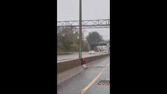 Heavy flooding submerges Long Island Expressway in Queens, New York