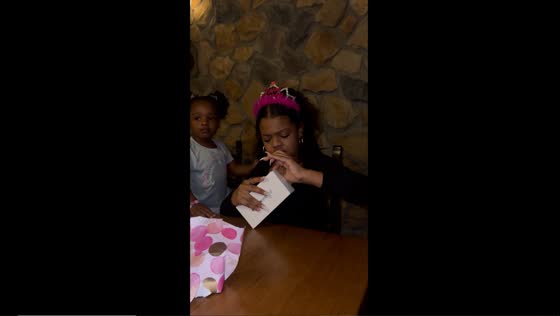Sister's excitement: birthday girl unwraps Apple watch surprise