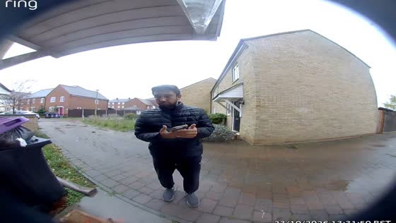 Delivery driver narrowly escapes a dog trying to attack him in London, UK