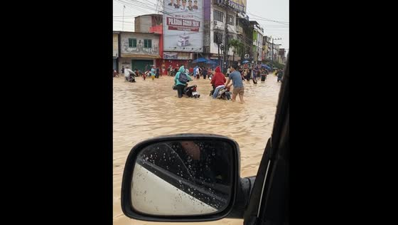 Heavy rains cause flooding in Medan, Indonesia