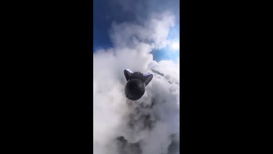 Skybound dreams: a harrowing wingsuit flight over London's cloudscape